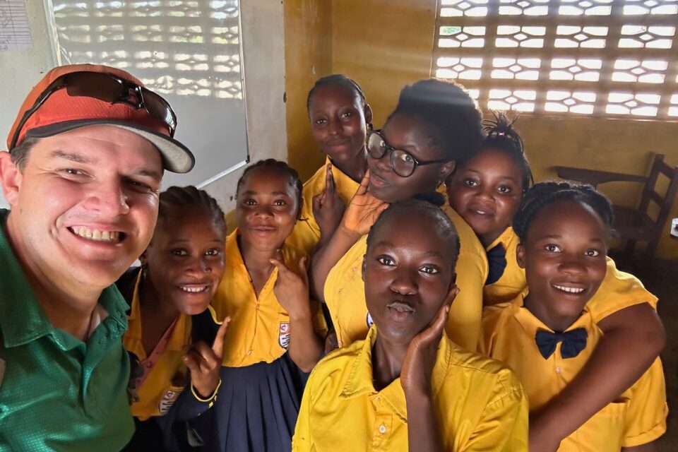 Pastor with students in Liberia