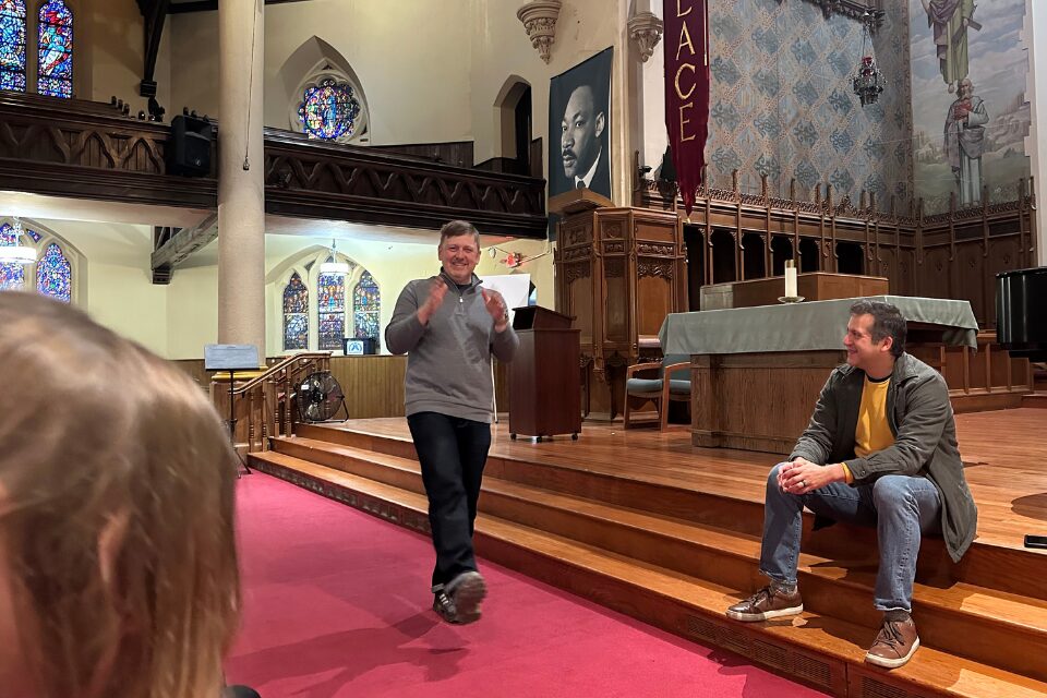 Deacon speaking to youth