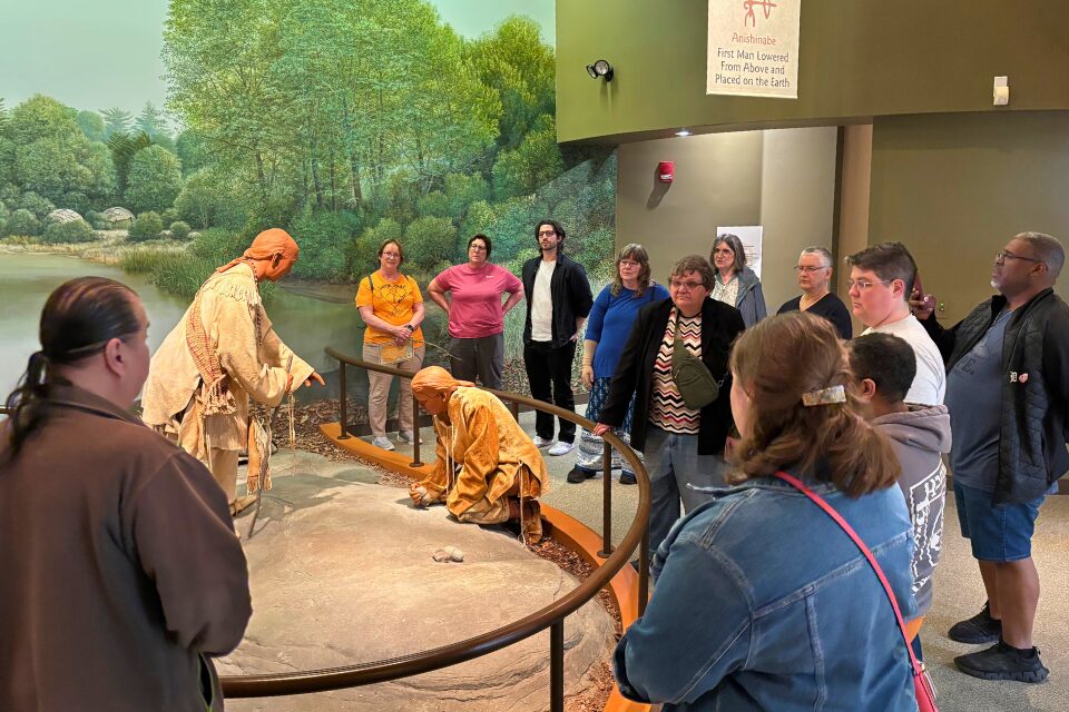 Giving a tour of a Native American museum