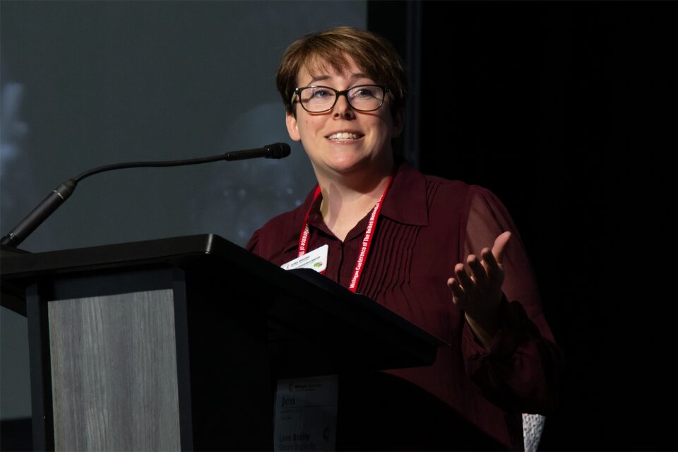 Woman speaking from podium