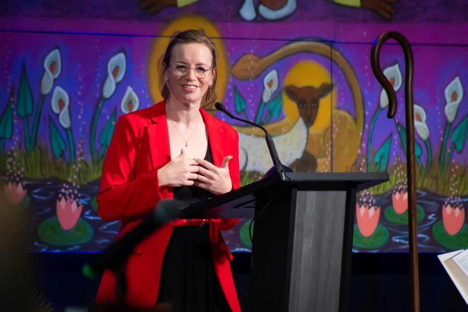 Woman speaking at podium