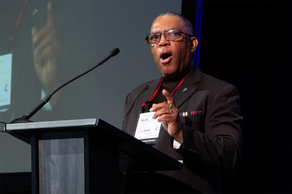 Man speaking at podium