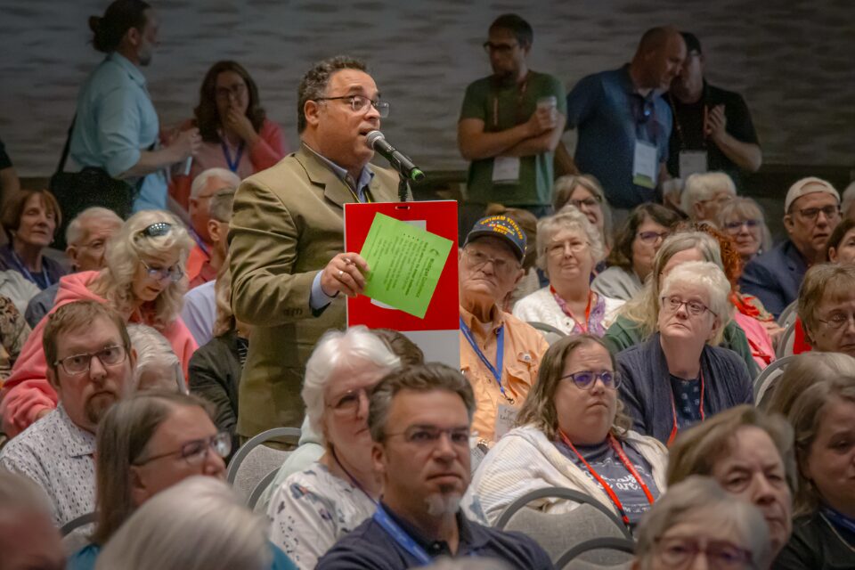 Man speaks at conference