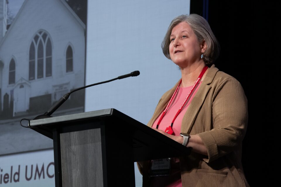 Woman speaking from podium