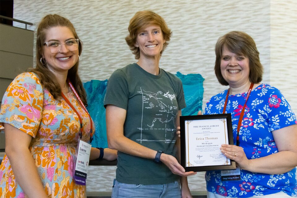Campus minister receiving award