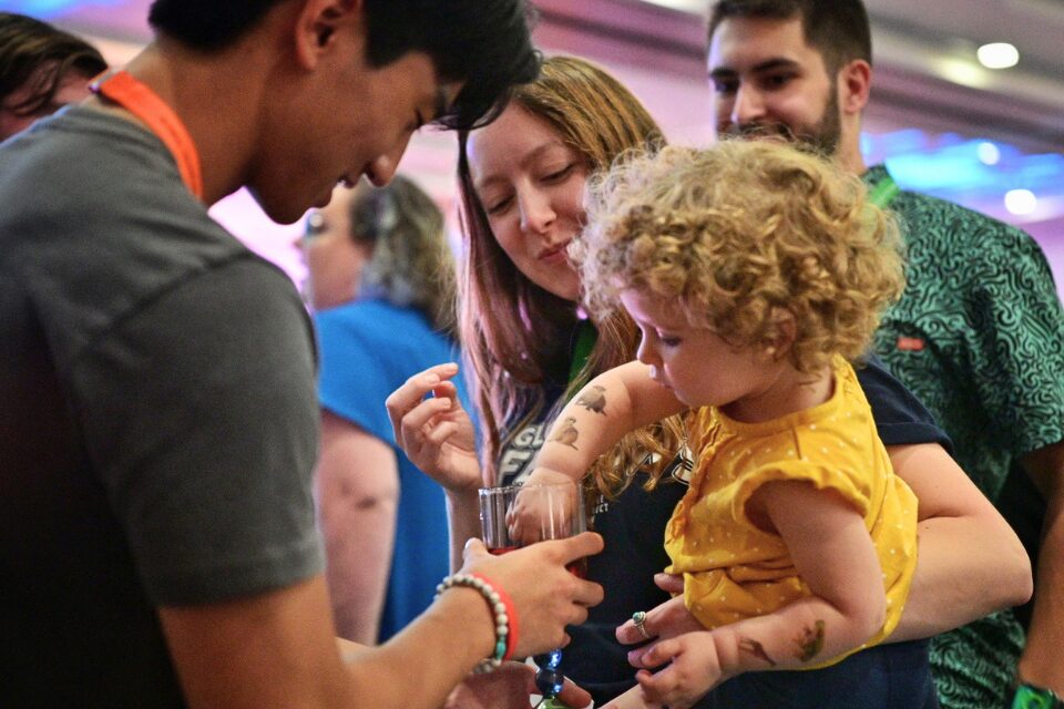Young adults taking communion