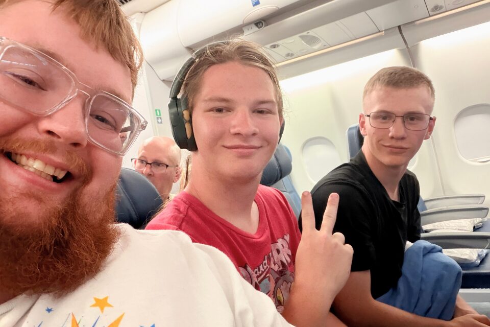 Three men on an airplane