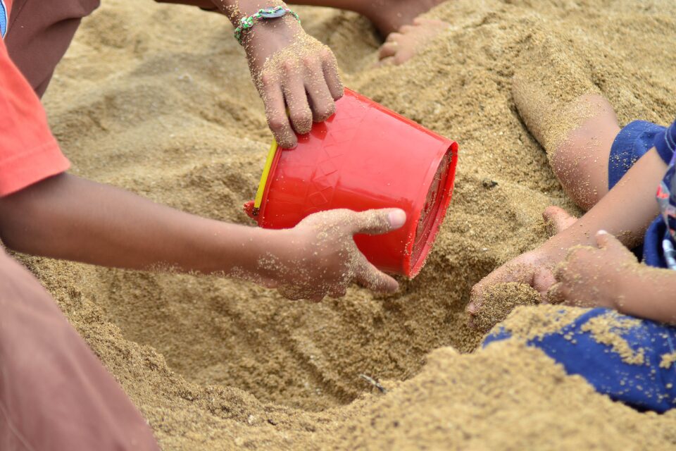 Kids playing in a sandbox