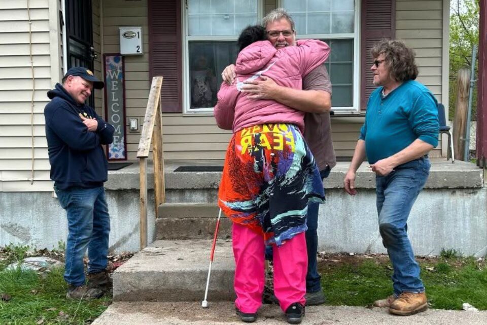 Two people hugging