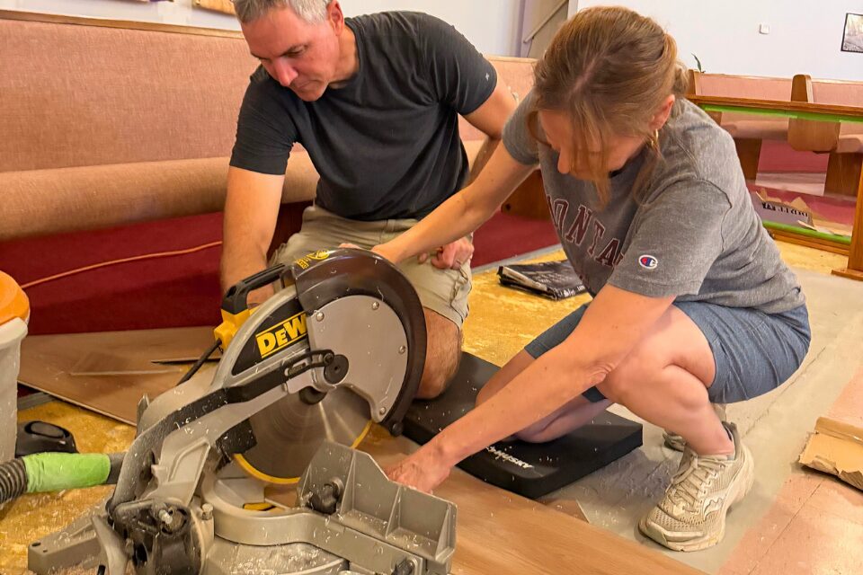 Woman running a saw
