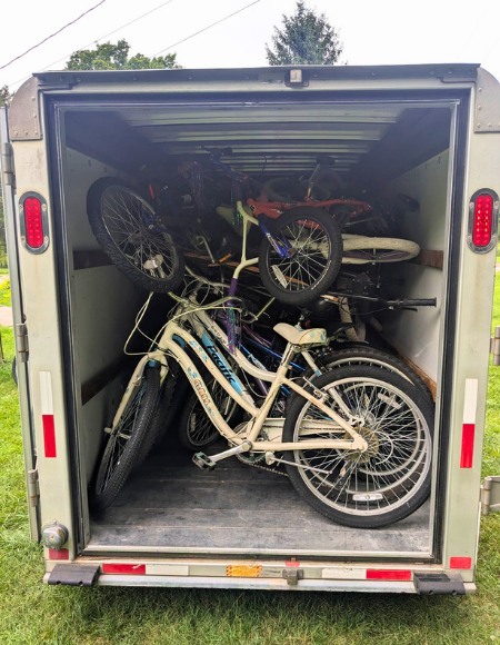 Bikes loaded onto a U-Haul trailer