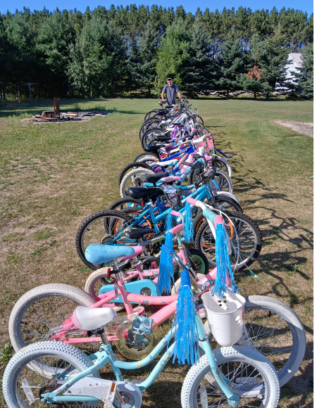 Todd and the bicycles he repaired